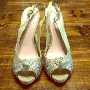 Tan and jeweled Heels